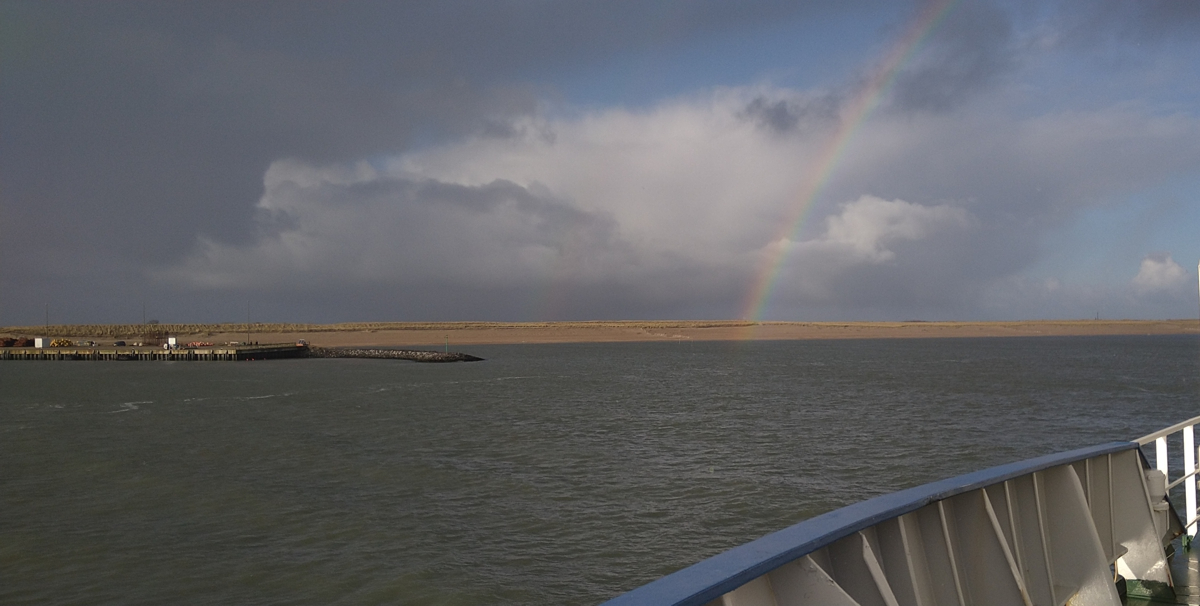 The rainbow over the island of Texel gives our leaving a special touch