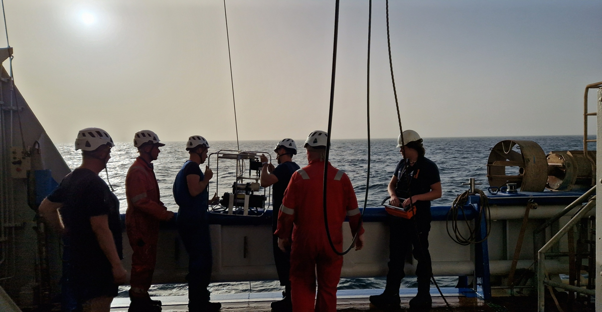 An in-situ pump is deployed by the NMF technicians and deck crew.